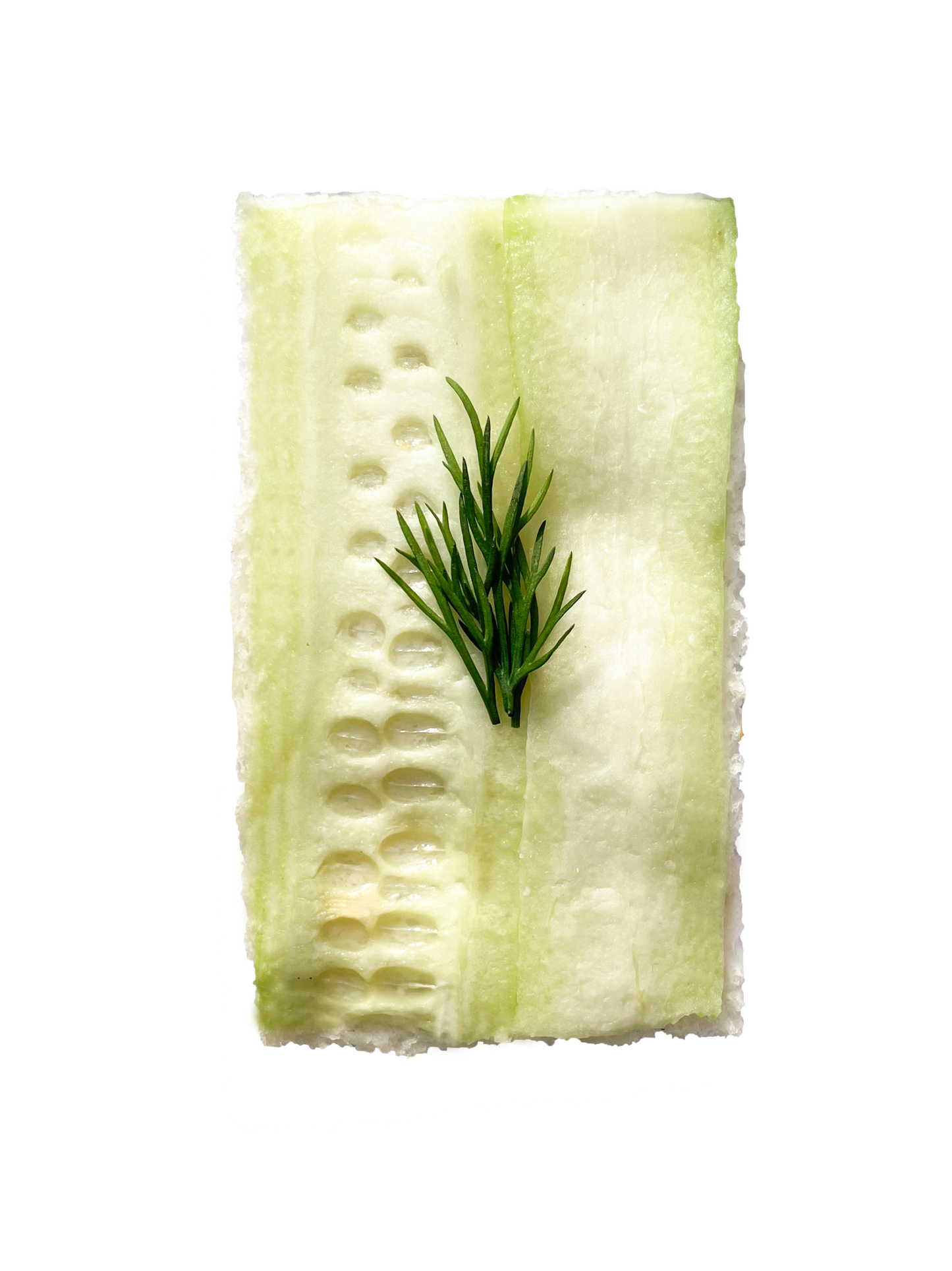 cucumber tea sandwich topped with cucumber slice and dill